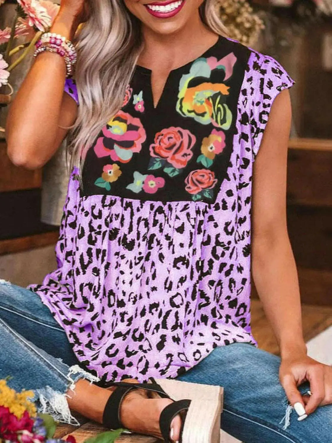 Full Size Leopard Floral Notched Cap Sleeve Blouse Plus Size - Women Plus Size by Trendsi | Available at Handbags Specialist Headquarter