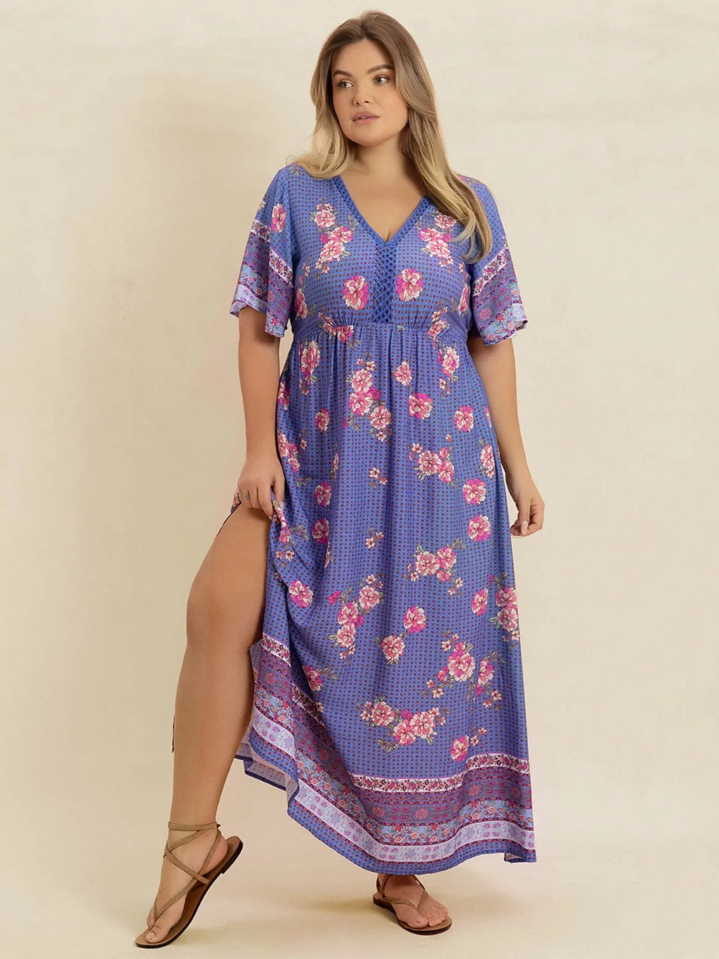 Plus Size Printed V-Neck Flutter Sleeve Dress - Dresses by Trendsi | Available at Handbags Specialist Headquarter