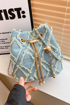Chain Drawstring Raw Edge Denim Bucket Bag - Crossbody Bag by Trendsi | Available at Handbags Specialist Headquarter