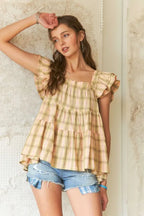ADORA Ruffled Square Neck Cap Sleeve Babydoll Blouse - Tops by Trendsi | Available at Handbags Specialist Headquarter