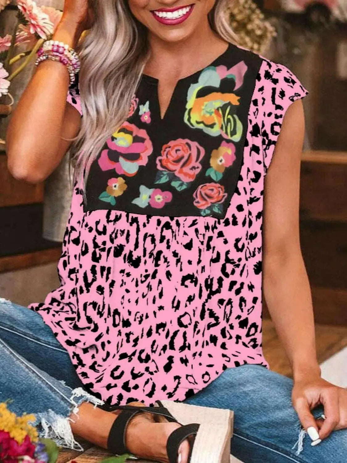 Full Size Leopard Floral Notched Cap Sleeve Blouse Plus Size - Women Plus Size by Trendsi | Available at Handbags Specialist Headquarter