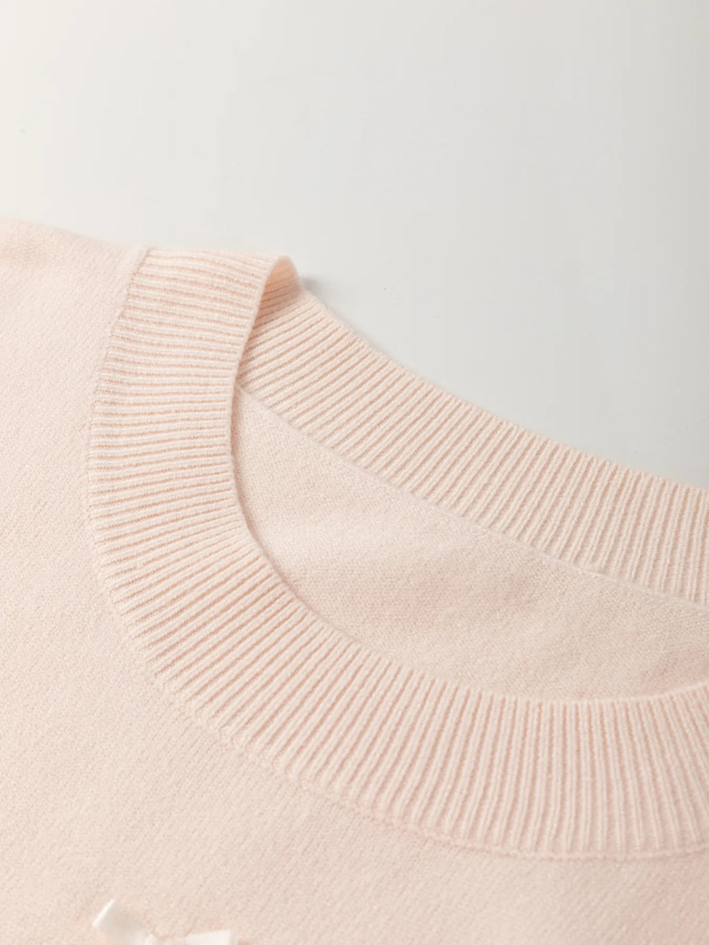 Pearl Embellished Bow Detail Short Sleeve Sweater - Tops by Trendsi | Available at Handbags Specialist Headquarter