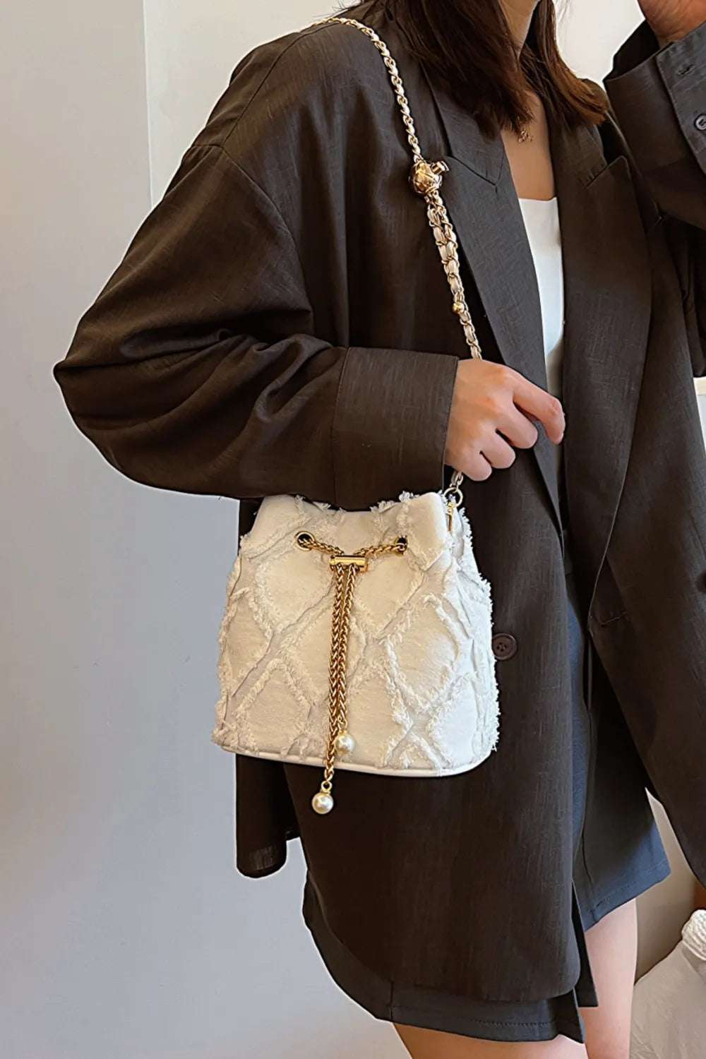 Chain Drawstring Raw Edge Denim Bucket Bag - Crossbody Bag by Trendsi | Available at Handbags Specialist Headquarter