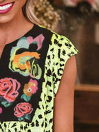 Full Size Leopard Floral Notched Cap Sleeve Blouse Plus Size - Women Plus Size by Trendsi | Available at Handbags Specialist Headquarter