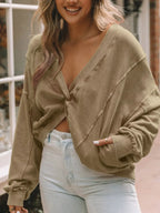 Exposed Seam Twisted V-Neck Sweatshirt - Women's sweatshirts by Trendsi | Available at Handbags Specialist Headquarter
