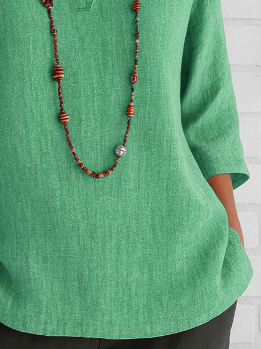 Full Size Notched Three-Quarter Sleeves Blouse Plus Size - Tops by Trendsi | Available at Handbags Specialist Headquarter