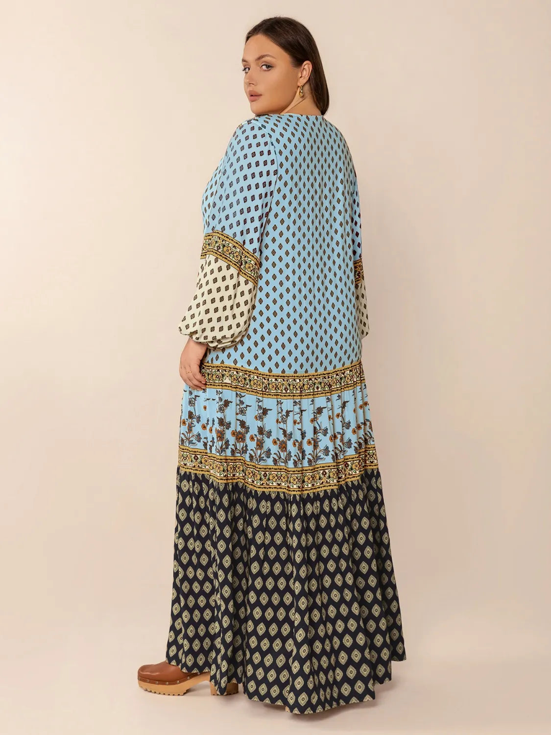 Plus Size Printed V-Neck Balloon Sleeve Maxi Dress - Dresses by Trendsi | Available at Handbags Specialist Headquarter