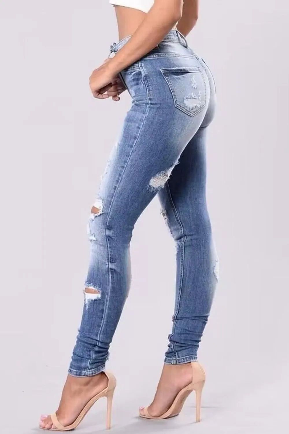 Full Size Distressed Skinny Jeans Plus Size - Women / Jeans & Denim by Trendsi | Available at Handbags Specialist Headquarter