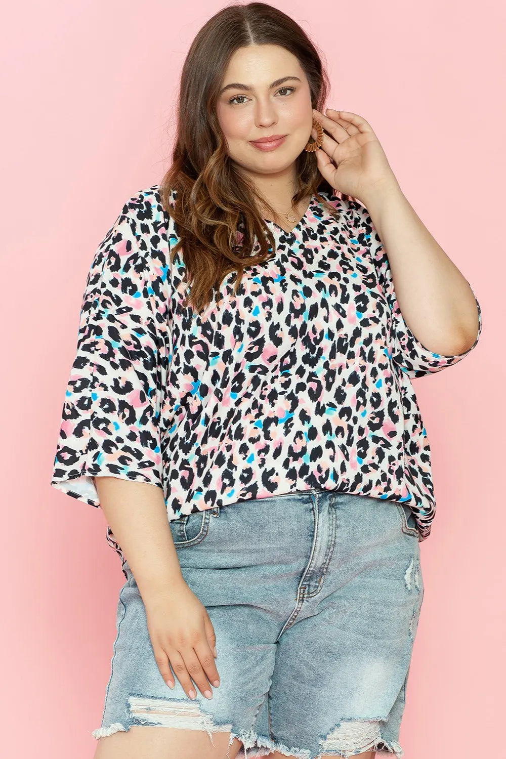 Plus Size Leopard V-Neck Three-Quarter Sleeve Blouse - Plus Size Shirts by Trendsi | Available at Handbags Specialist Headquarter