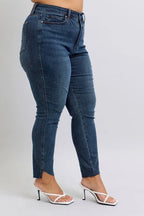 Judy Blue Full Size High Waist Tummy Control Step Hem Skinny Jeans Plus Size - Women / Jeans & Denim by Trendsi | Available at Handbags Specialist Headquarter