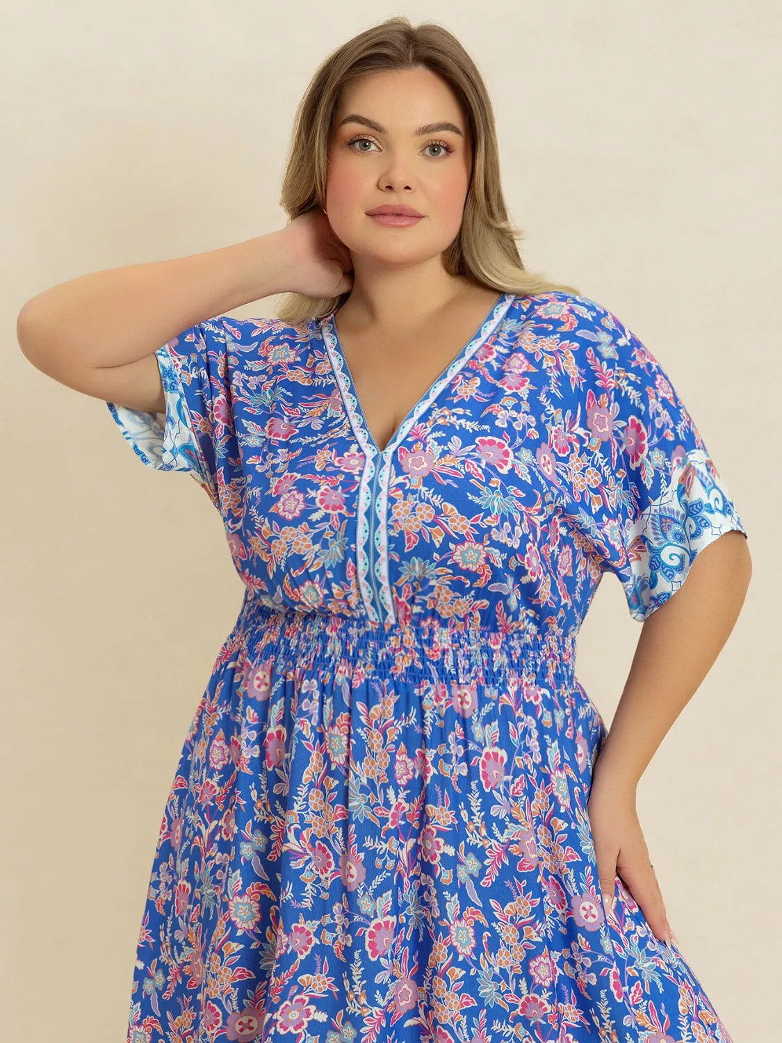 Plus Size Smocked Printed Half Sleeve Midi Dress - Dresses by Trendsi | Available at Handbags Specialist Headquarter