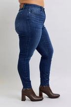 Judy Blue Full Size Mid Rise Skinny Jeans with Raw Hem Plus Size - Women / Jeans & Denim by Trendsi | Available at Handbags Specialist Headquarter