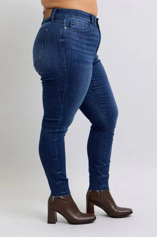 Judy Blue Full Size Mid Rise Skinny Jeans with Raw Hem Plus Size - Women / Jeans & Denim by Trendsi | Available at Handbags Specialist Headquarter