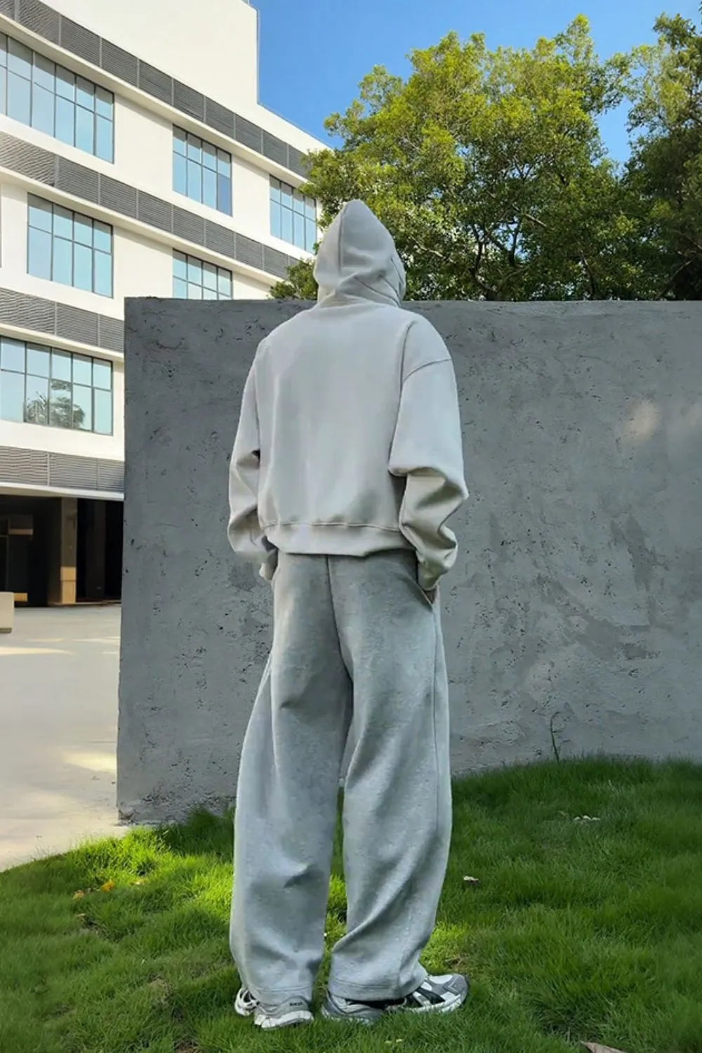 Men's Drop Shoulder Long Sleeve Hoodie with Pocket - Men's Sweatshirts by Trendsi | Available at Handbags Specialist Headquarter