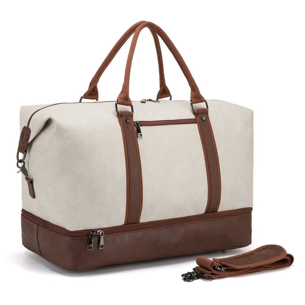 Cream and brown duffel bag with top handles, front zipper pocket, and a detachable strap.