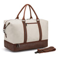 Cream and brown duffel bag with top handles, front zipper pocket, and a detachable strap.