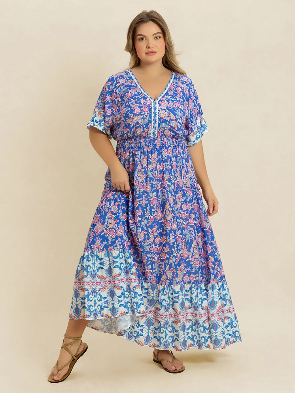 Plus Size Smocked Printed Half Sleeve Midi Dress - Dresses by Trendsi | Available at Handbags Specialist Headquarter