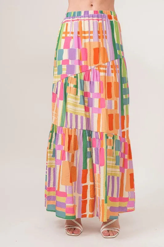 And The Why Asymmetric Geo Printed Tiered Maxi Skirt - Skirts by Trendsi | Available at Handbags Specialist Headquarter