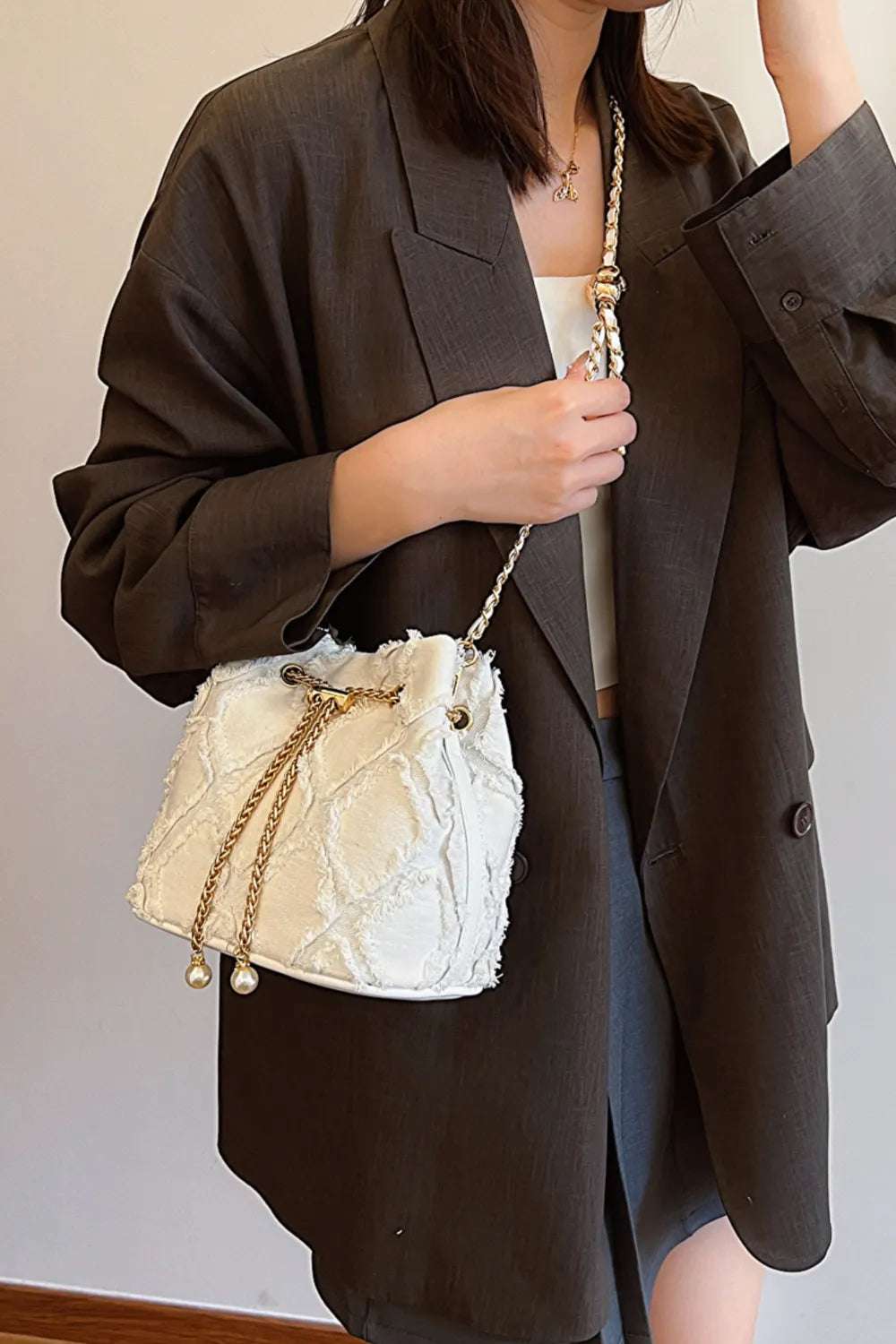 Chain Drawstring Raw Edge Denim Bucket Bag - Crossbody Bag by Trendsi | Available at Handbags Specialist Headquarter