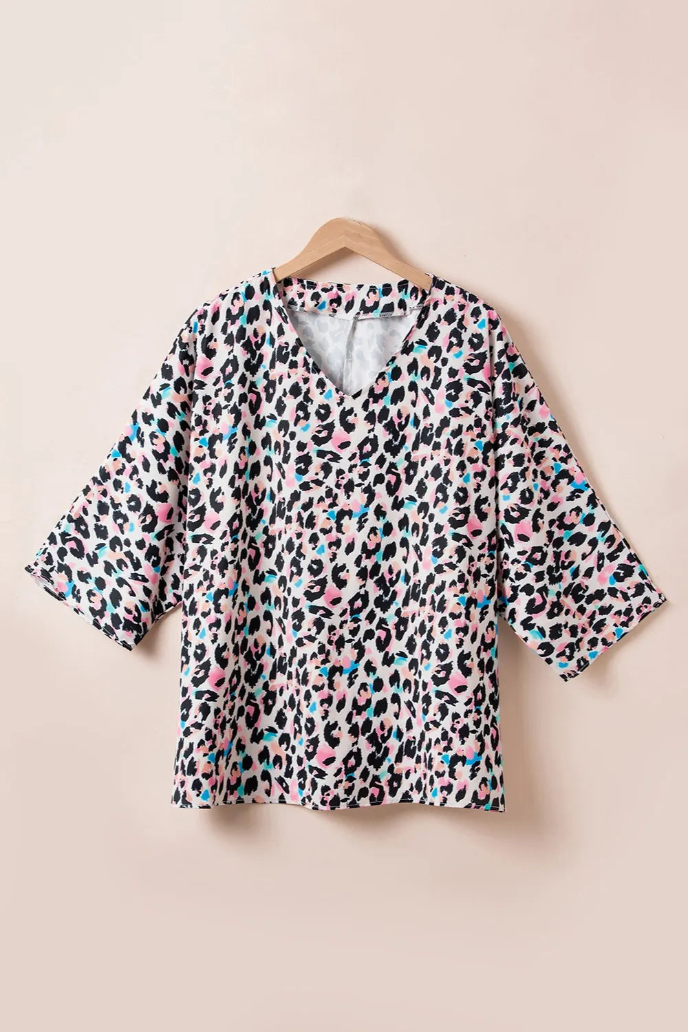 Plus Size Leopard V-Neck Three-Quarter Sleeve Blouse - Plus Size Shirts by Trendsi | Available at Handbags Specialist Headquarter