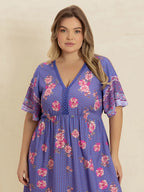 Plus Size Printed V-Neck Flutter Sleeve Dress - Dresses by Trendsi | Available at Handbags Specialist Headquarter