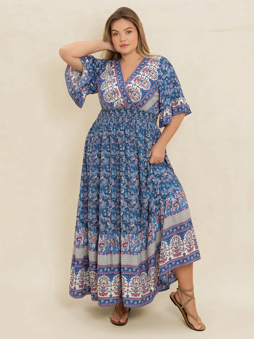 Plus Size Printed Surplice Half Sleeve Dress - Dresses by Trendsi | Available at Handbags Specialist Headquarter