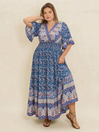 Plus Size Printed Surplice Half Sleeve Dress - Dresses by Trendsi | Available at Handbags Specialist Headquarter