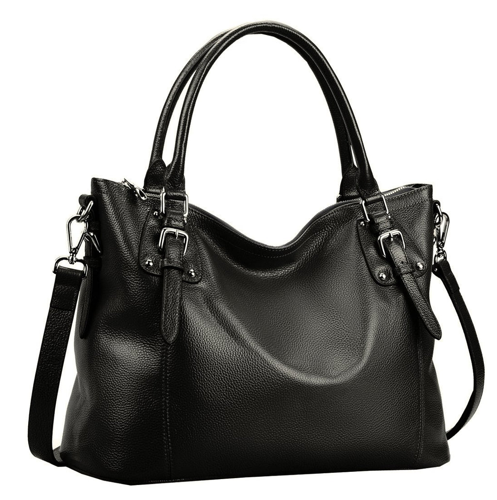 Black leather handbag with silver buckles and handles, featuring a detachable shoulder strap.