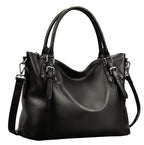 Black leather handbag with silver buckles and handles, featuring a detachable shoulder strap.