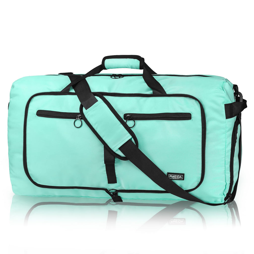 Teal duffle bag with black zippers and straps, featuring a padded shoulder strap and two front pockets.