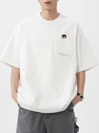 Men's Plus Size Round Neck Embroidered T-Shirt - Men's T-Shirt by Trendsi | Available at Handbags Specialist Headquarter