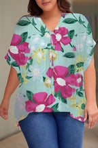 Plus Size Printed Notched Neck Half Sleeve Top - Plus Size Shirts by Trendsi | Available at Handbags Specialist Headquarter