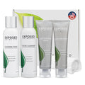 Skincare set with two bottles and two tubes on a white box with a green leaf and flag emblem.