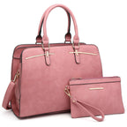 Pink handbag set with gold accents, includes a large tote and matching wristlet pouch.