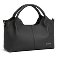 Black textured leather handbag with curved handles and gold accents.