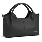 Black textured leather handbag with curved handles and gold accents.