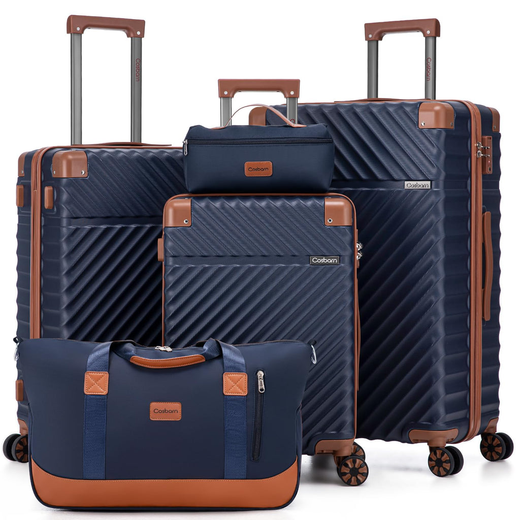 Navy blue luggage set with brown trim, including suitcases on wheels and a duffle bag.