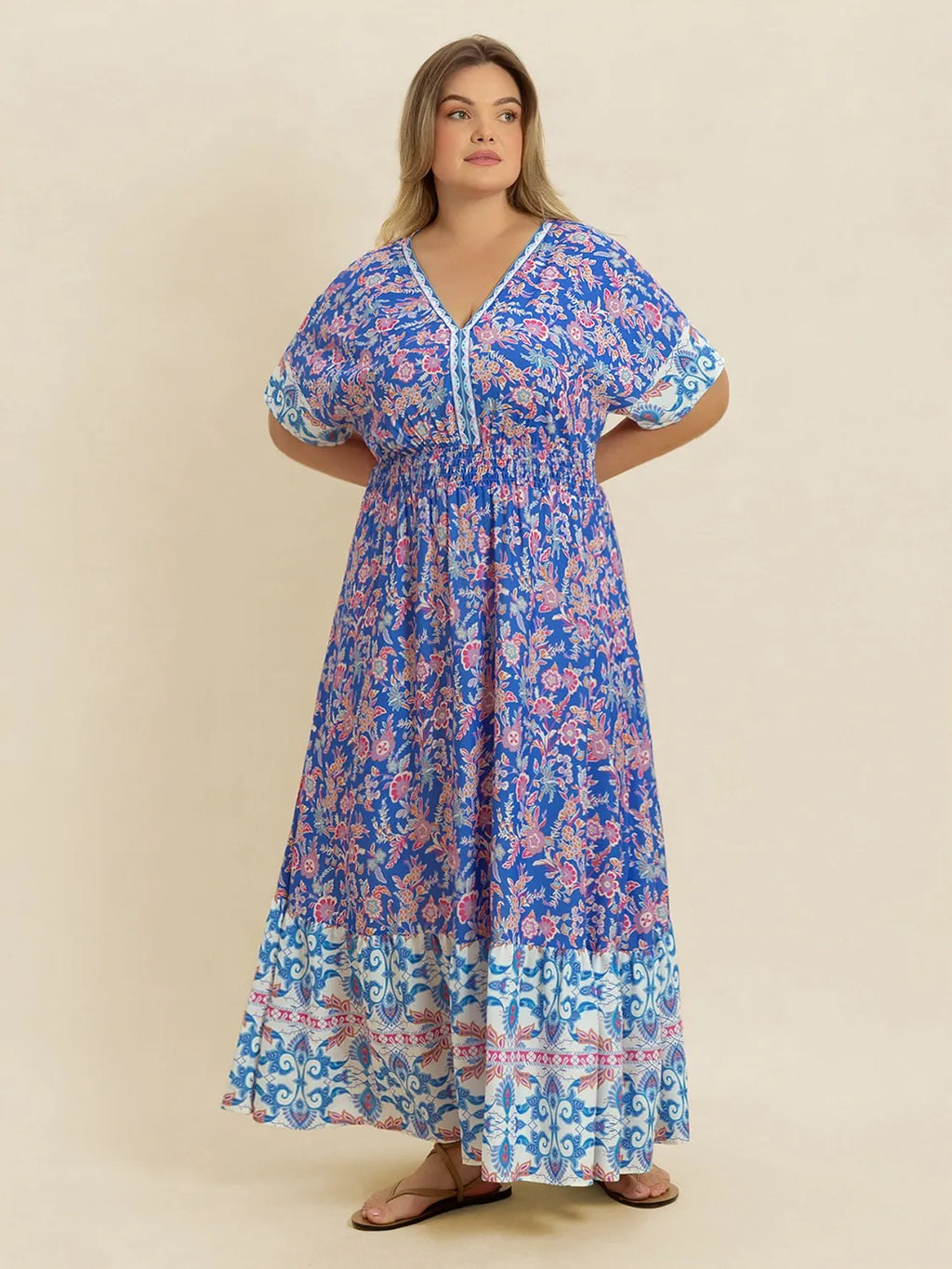 Plus Size Smocked Printed Half Sleeve Midi Dress - Dresses by Trendsi | Available at Handbags Specialist Headquarter