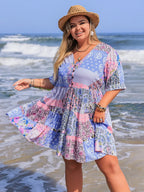 Plus Size Printed V-Neck Tiered Mini Dress - Dresses by Trendsi | Available at Handbags Specialist Headquarter