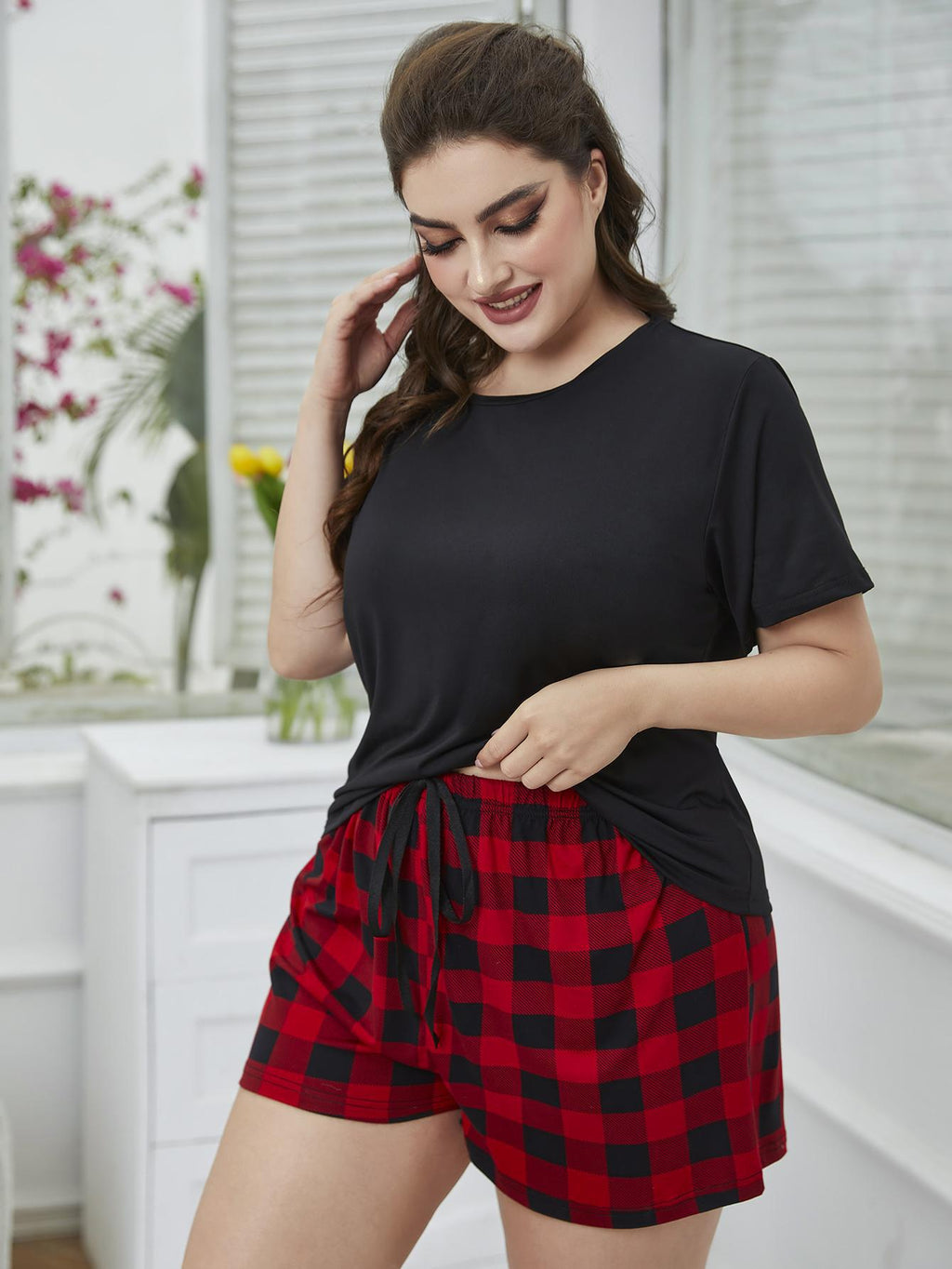 Plus Size Round Neck Tee Shirt and Plaid Shorts Lounge Set - Plus Size Shirts by Trendsi | Available at Handbags Specialist Headquarter
