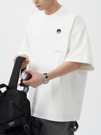 Men's Plus Size Round Neck Embroidered T-Shirt - Men's T-Shirt by Trendsi | Available at Handbags Specialist Headquarter