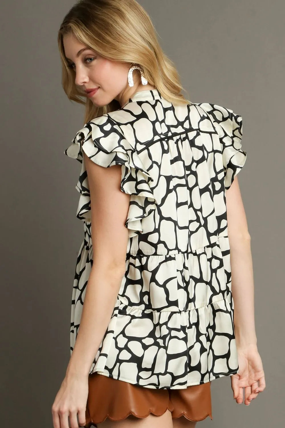 Umgee Full Size Two Tone Animal Print Notched Ruffle Cap Sleeve Blouse Plus Size - Dresses by Trendsi | Available at Handbags Specialist Headquarter