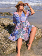 Plus Size Printed V-Neck Tiered Mini Dress - Dresses by Trendsi | Available at Handbags Specialist Headquarter