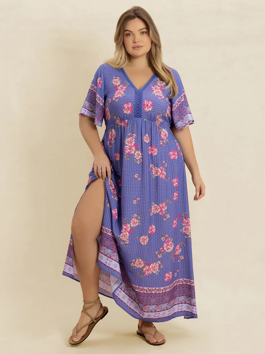 Plus Size Printed V-Neck Flutter Sleeve Dress - Dresses by Trendsi | Available at Handbags Specialist Headquarter