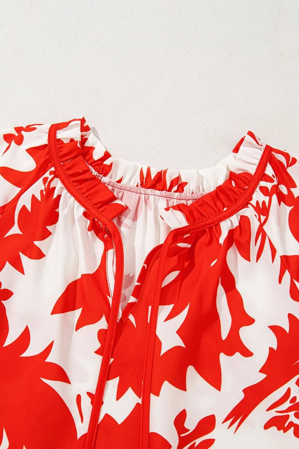 Plant Print Tiered Ruffled Sleeve Tie Neck Blouse - Tops by Trendsi | Available at Handbags Specialist Headquarter