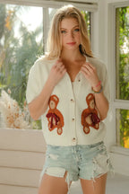 BiBi Teddy Bear With Bow Patched Sweater Button Down Top - Tops by Trendsi | Available at Handbags Specialist Headquarter