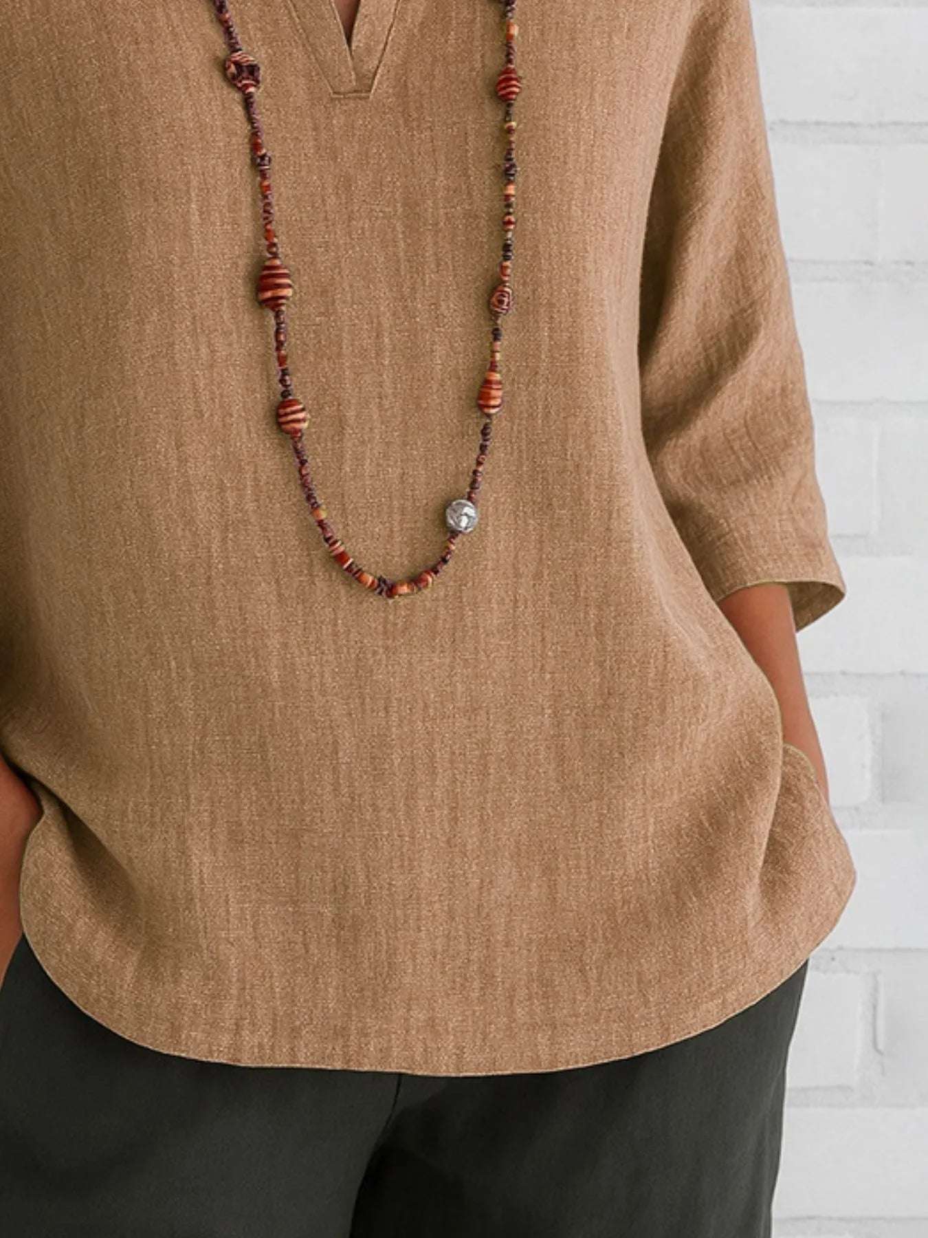 Full Size Notched Three-Quarter Sleeves Blouse Plus Size - Tops by Trendsi | Available at Handbags Specialist Headquarter