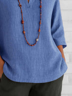 Full Size Notched Three-Quarter Sleeves Blouse Plus Size - Tops by Trendsi | Available at Handbags Specialist Headquarter