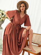 Plus Size V-Neck Flutter Sleeve Midi Dress - Dresses by Trendsi | Available at Handbags Specialist Headquarter