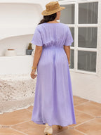 Plus Size Swiss Dot High-Low Surplice Dress - Dresses by Trendsi | Available at Handbags Specialist Headquarter